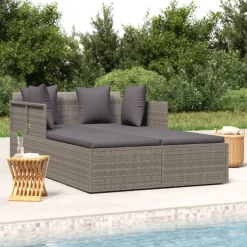 vidaXL Ligbed met kussens 182x118x63 cm poly rattan grijs