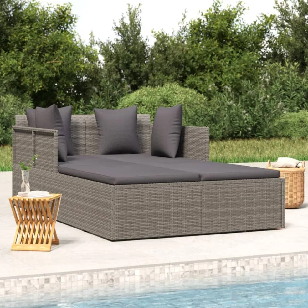 vidaXL Ligbed met kussens 182x118x63 cm poly rattan grijs