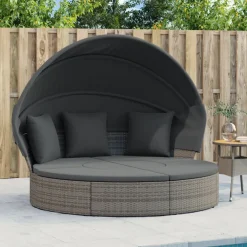 vidaXL Loungebed met luifel en kussens poly rattan grijs
