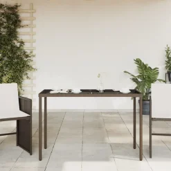 vidaXL Tuintafel met glazen blad 115x54x74 cm poly rattan bruin